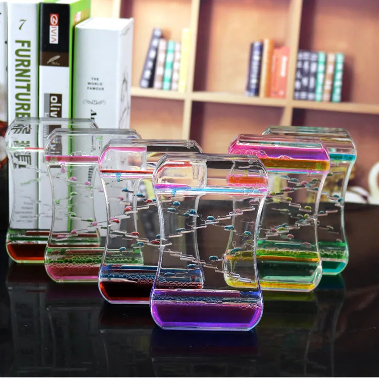 Ampulheta Divertida com Gotas Coloridas – Decoração Criativa.
